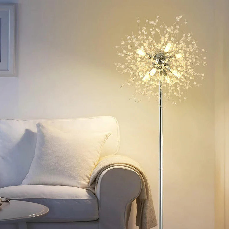 Decorative floor lamp in a living room setting with a sofa and table.